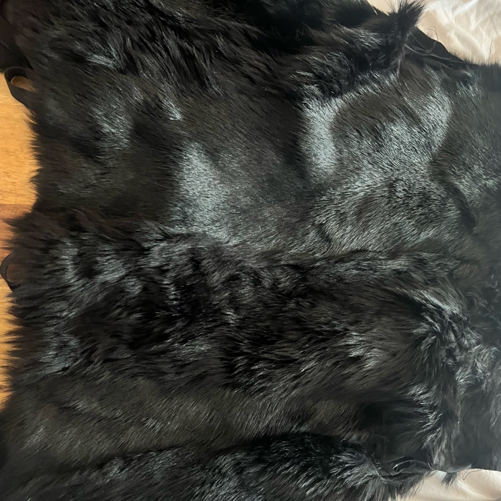 Rich black fur vest with wrap around tie